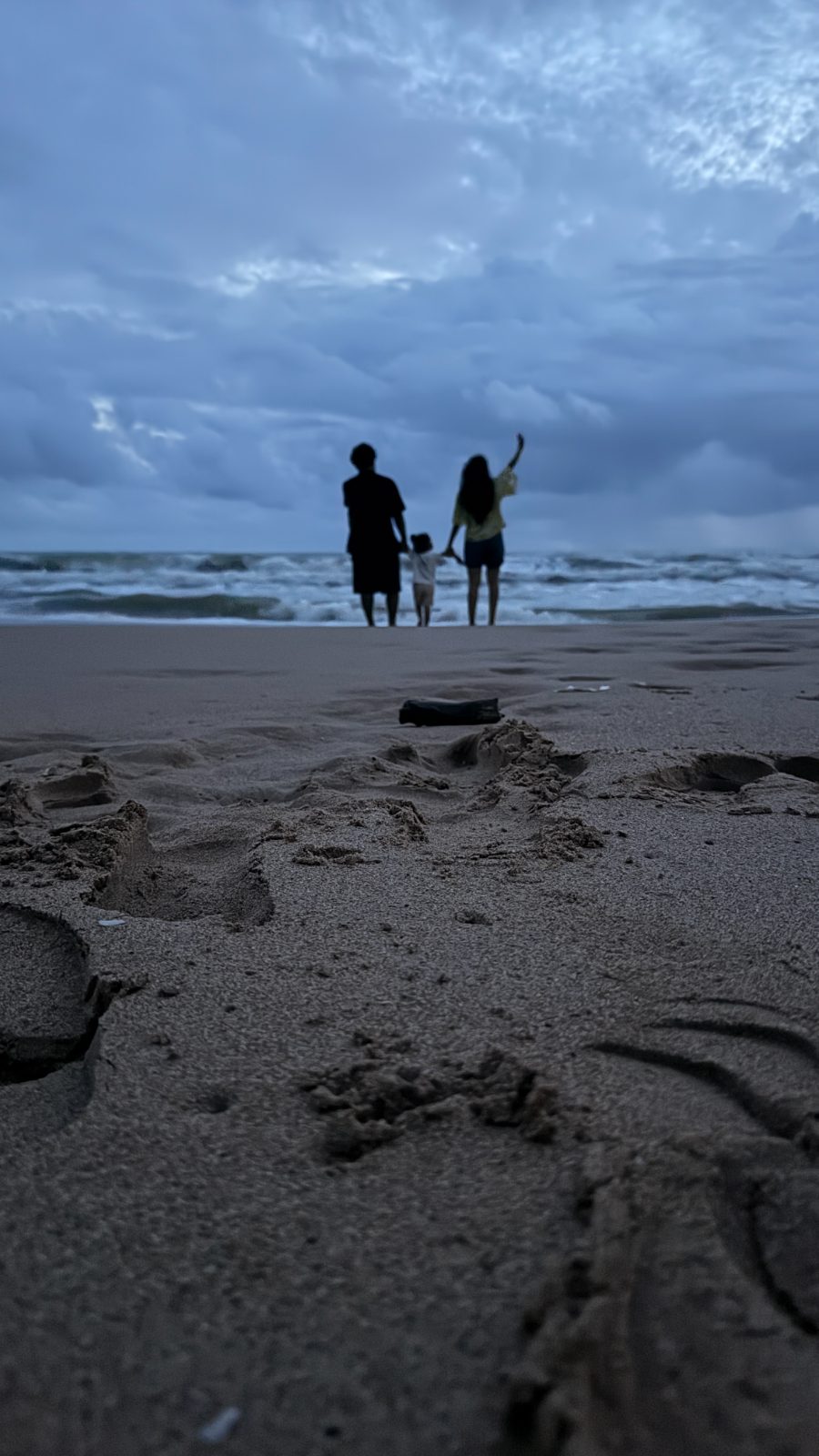Our family on the beach at dusk