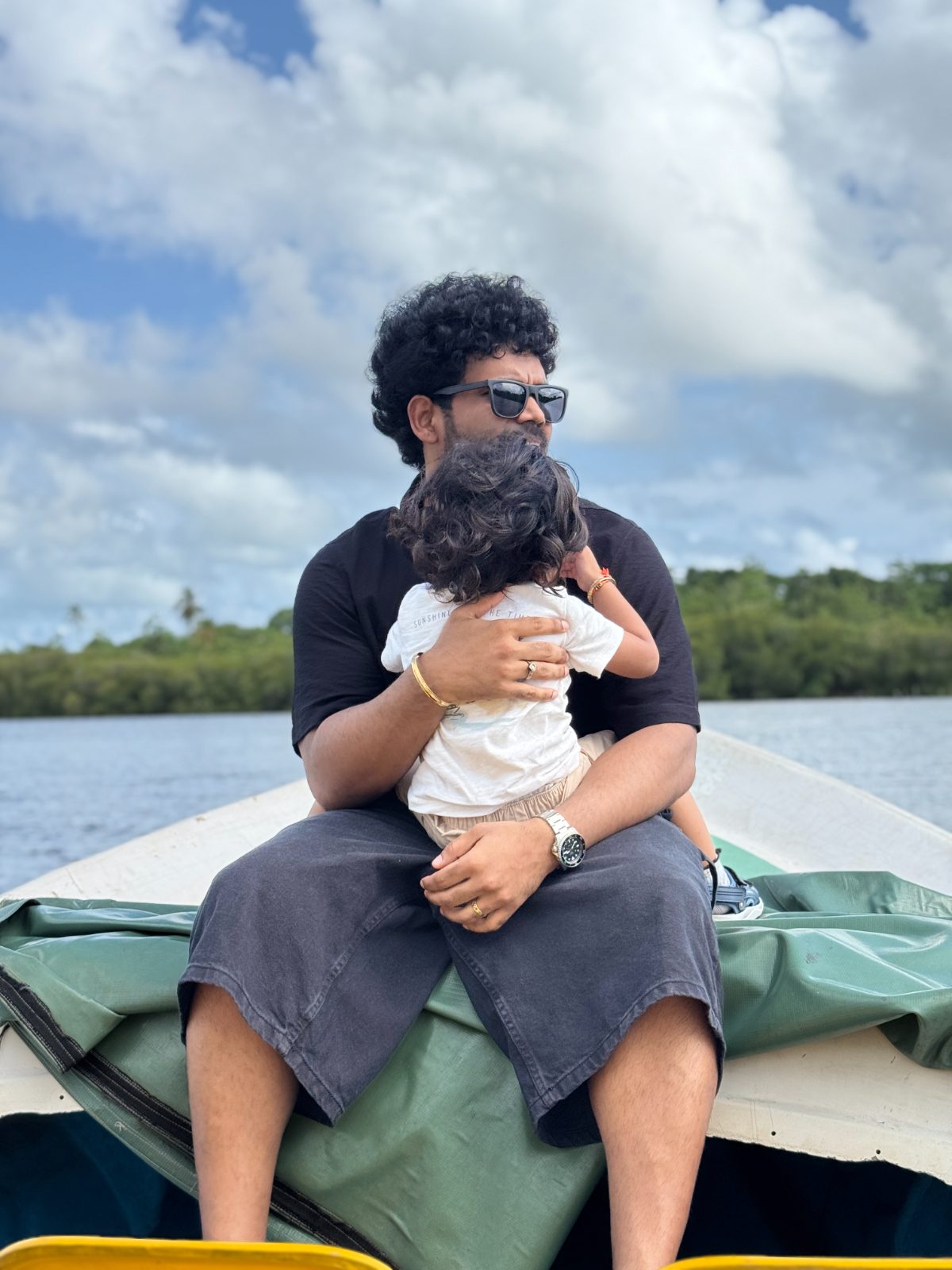 Anand and our explorer on a boat