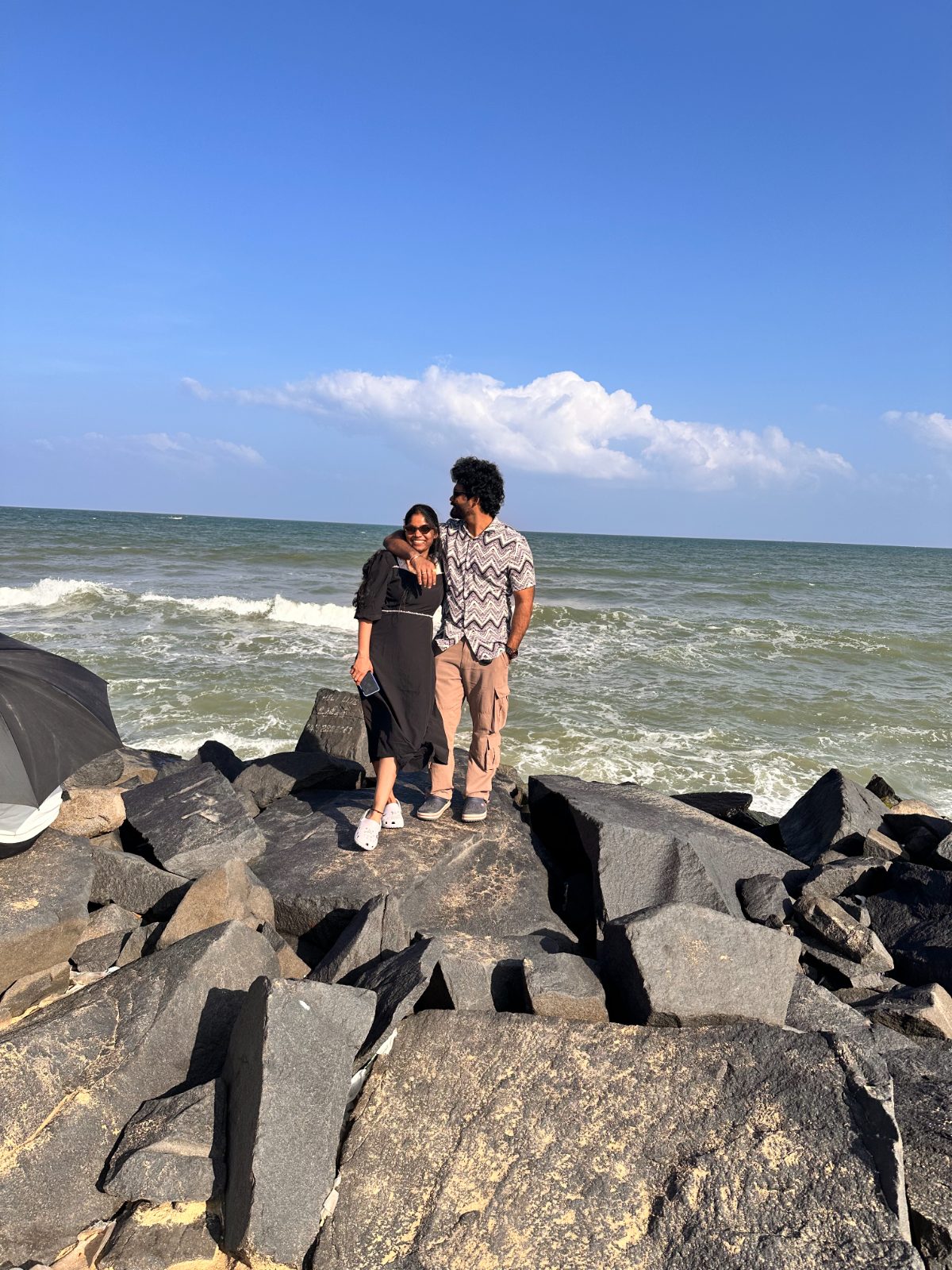 Aruna and Anand by the sea